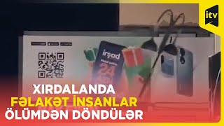 Xırdalanda güclü külək nəticəsində işıq dirəyi avtobusun üzərinə aşıb