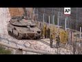 israeli tanks seen moving inside the buffer zone between occupied golan heights and syria