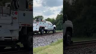 Track inspector stops to wait on a train