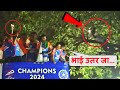 Watch A Fan climbed on the tree to see the Indian Players during Team India Victory Parade
