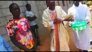 REV Bishop Norman King'oo Wambua blessing the St joseph katulye catholic church.