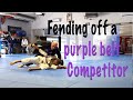 Surviving against a purple belt competitor