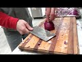 horizontal swipes on onions with Chinese cleaver