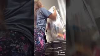 Gas Station Cashier emptying trash cans