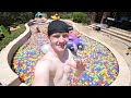 I FILLED MY ENTIRE POOL WITH BALL PIT BALLS
