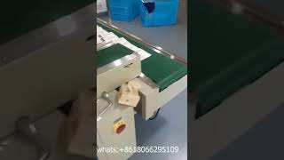 Automatic folding and packaging machine for disposable towel and bath towel non-woven fabric