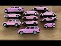 various diecast model cars from the floor pink cars