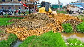 So Skills Operator Building New Foundation Village Road BY Dozer DR51PX Spreading Stone Across Field