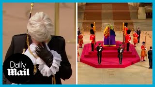 Emotional moment Black Rod wipes away a tear by the Queen's coffin on day of funeral
