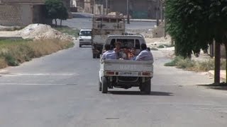 Scared Aleppo residents flee the onslaught