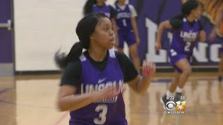 Lincoln High Girl's Basketball Player At Head Of Class On And Off Court