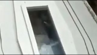 Terrifying Moment A Corpse Waves To Mourners Through The Coffin Window