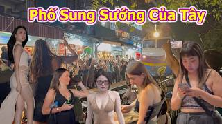 Westerners cheered with joy as the train arrived at Hanoi Train Street.