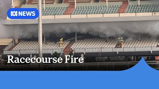 Grandstand at Melbourne racecourse damaged in suspicious fire | ABC News