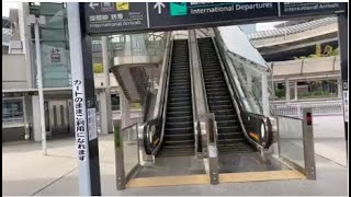 成田空港第一ターミナル駐車場から2階入口へ行くエスカレーターと動く歩道 _escalator and moving walkway Narita Airport Terminal 1 Japan