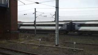 43290 and 43206 race past Darlington