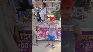 a small child win a prize of 10.000 rs from Kk lottery doraha