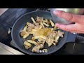 ginger miso stir fried pork ribs and trumpet mushrooms accented with perilla