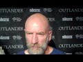 Outlander TV News’ Tartan Carpet Interview with Graham McTavish