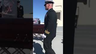 Jocko Willink pounds his SEAL Trident into Cmdr Seth Stone’s Casket
