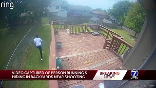 Video shows person running, hiding in backyards near Northwest High School after shooting