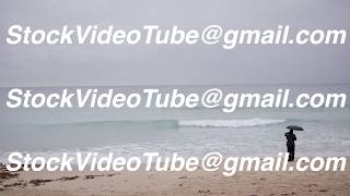 Travel Tourism YouTube Stock Video Footage Couple Standing on Beach with Umbrella