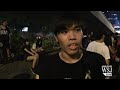 hong kong protesters sing in the rain