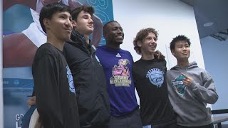 Olympic gold medalist Grant Holloway sharing a moment with track \u0026 field athletes as his annual invi