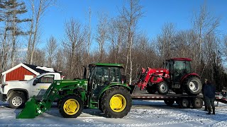 A new tractor and moving pigs