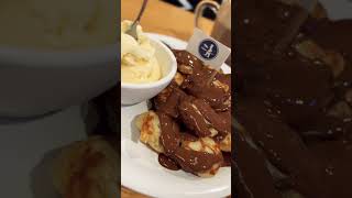 Amsterdam Food Poffertjes (mini Dutch pancakes) with chocolate sauce #munchies #amsterdam