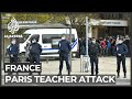 Police arrest nine after teacher beheaded in Paris suburb