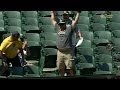 LAA@OAK: A's fan makes a grab on Lowrie's foul ball