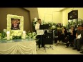 Mr Leow Tze Wen sings at the wake of his father, Mr Leow Siah Fah