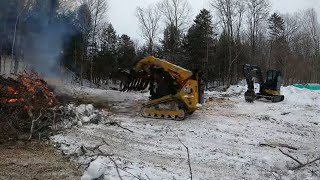 Cutting Trees on Future House Site With Cat 259D3 and Deere 50G