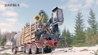 KESLA 2112Z CRANE LOADING TIMBER LOGS INTO TRUCK