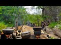 Hadza Tribe's Hunters Shelter Under Large Rock After Catching Big Animal