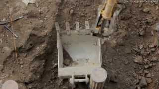 Komatsu PC200 attaching bucket with quick coupler