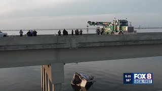 Search for driver underway after crash on Twin Span sends vehicles into lake