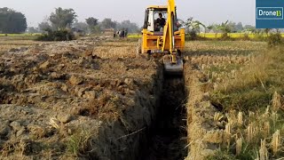 Connecting New Suburb Zone to City-Backhoe Loader-Drain Construction