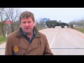 pro russian forces surround crimea base