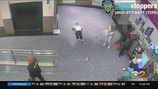 Bystanders look on after man sucker punched at Brooklyn mall