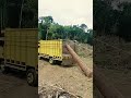 the process of self loading a log onto a truck