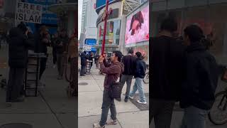 “JESUS is GOD” #Streetevangelism + #HolyRosary #yongedundassquare #toronto #eaton