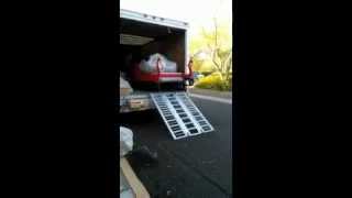 Distributing blankets to homeless - unloading Sleigh bed