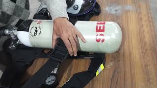 SEBA-COMPRESSED AIR BREATHING APPARATUS- HOW TO FIT CYLINDER TO BACK PLATE HAVING BELT AND BUCKLE