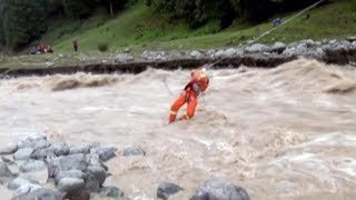 Firefighters rescue residents trapped by flood