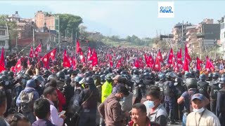 Clashes in Nepal: crowd faces Riot Police in Kathmandu demanding restoration of the monarchy