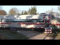 German high speed train (ICE3) and Dutch railroad crossing