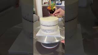 The secret to smoothing out buttercream cakes! Cake scraper, light pressure and practice!