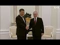 putin welcomes xi to the kremlin in moscow voa news